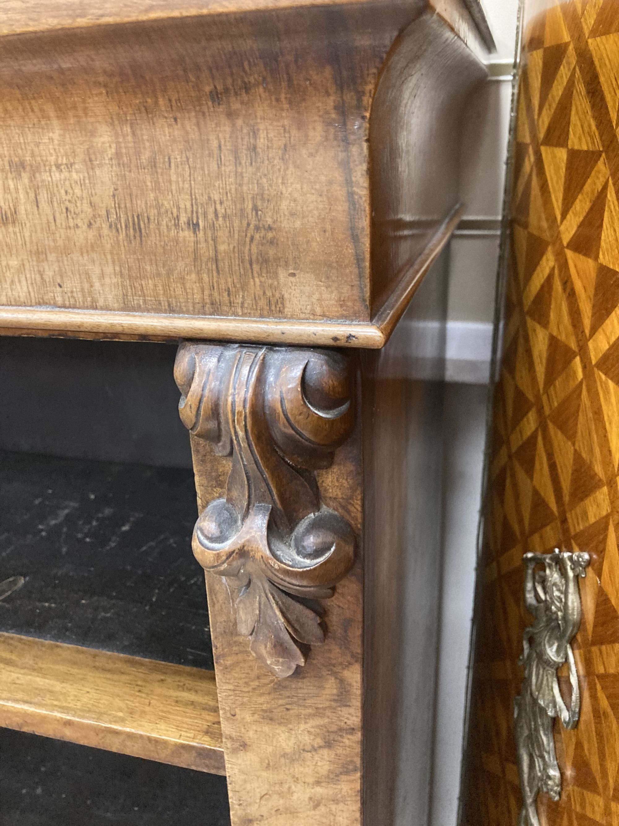 A Victorian walnut open bookcase, length 121cm, depth 34cm, height 107cm